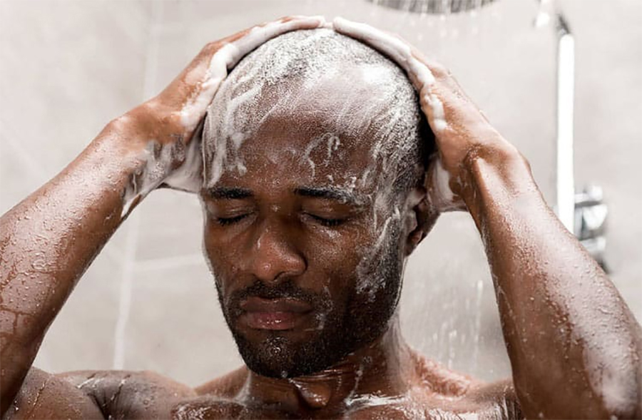 washing black bald head